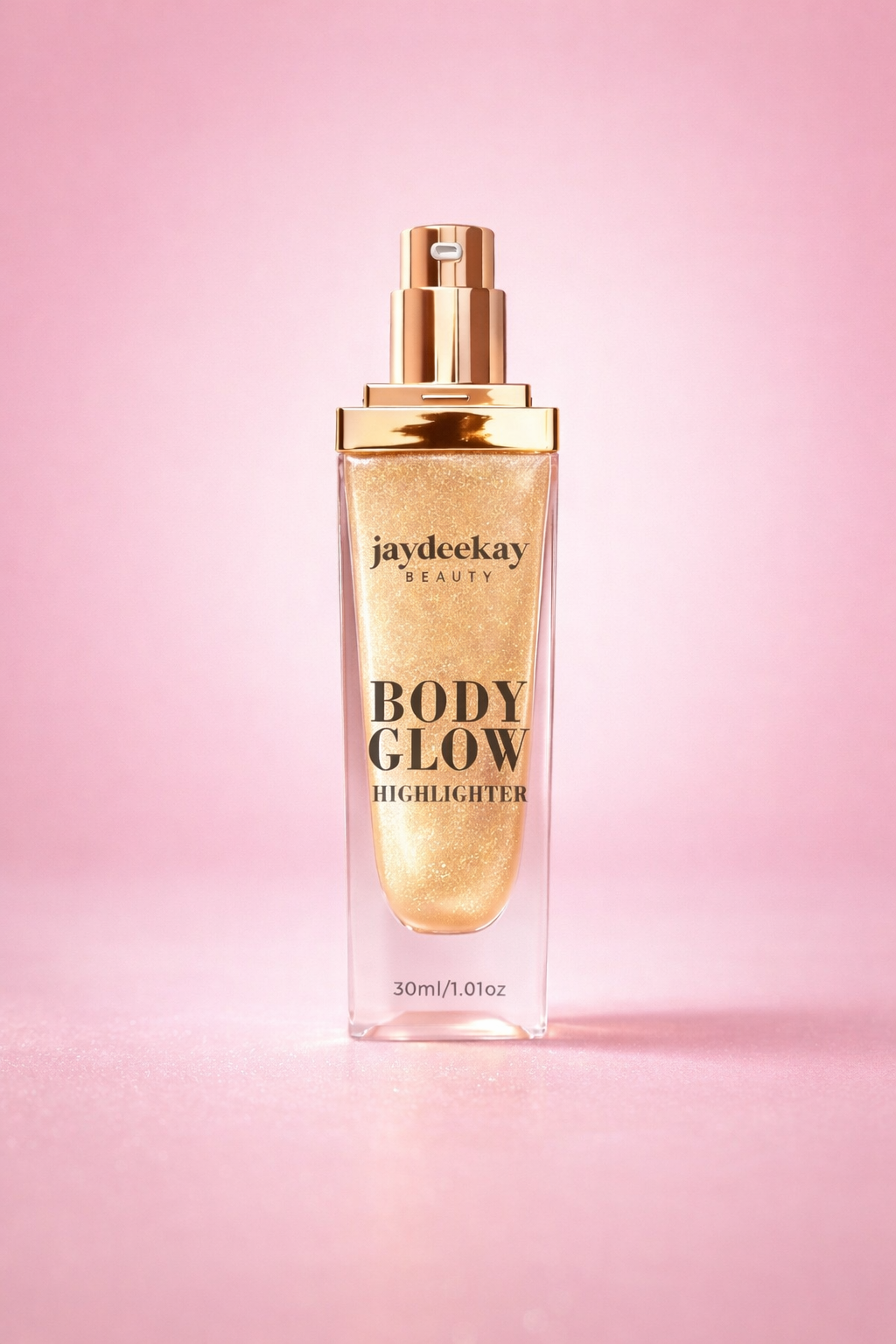 Jaydeekay Body Glow Highlighter bottle on a pink background